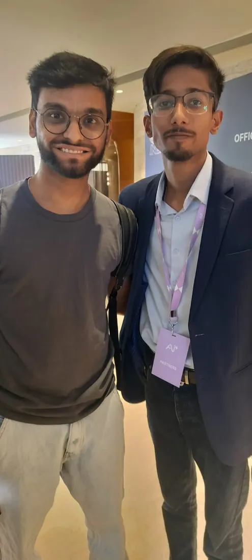 Sarwang Shukla networking at a tech conference